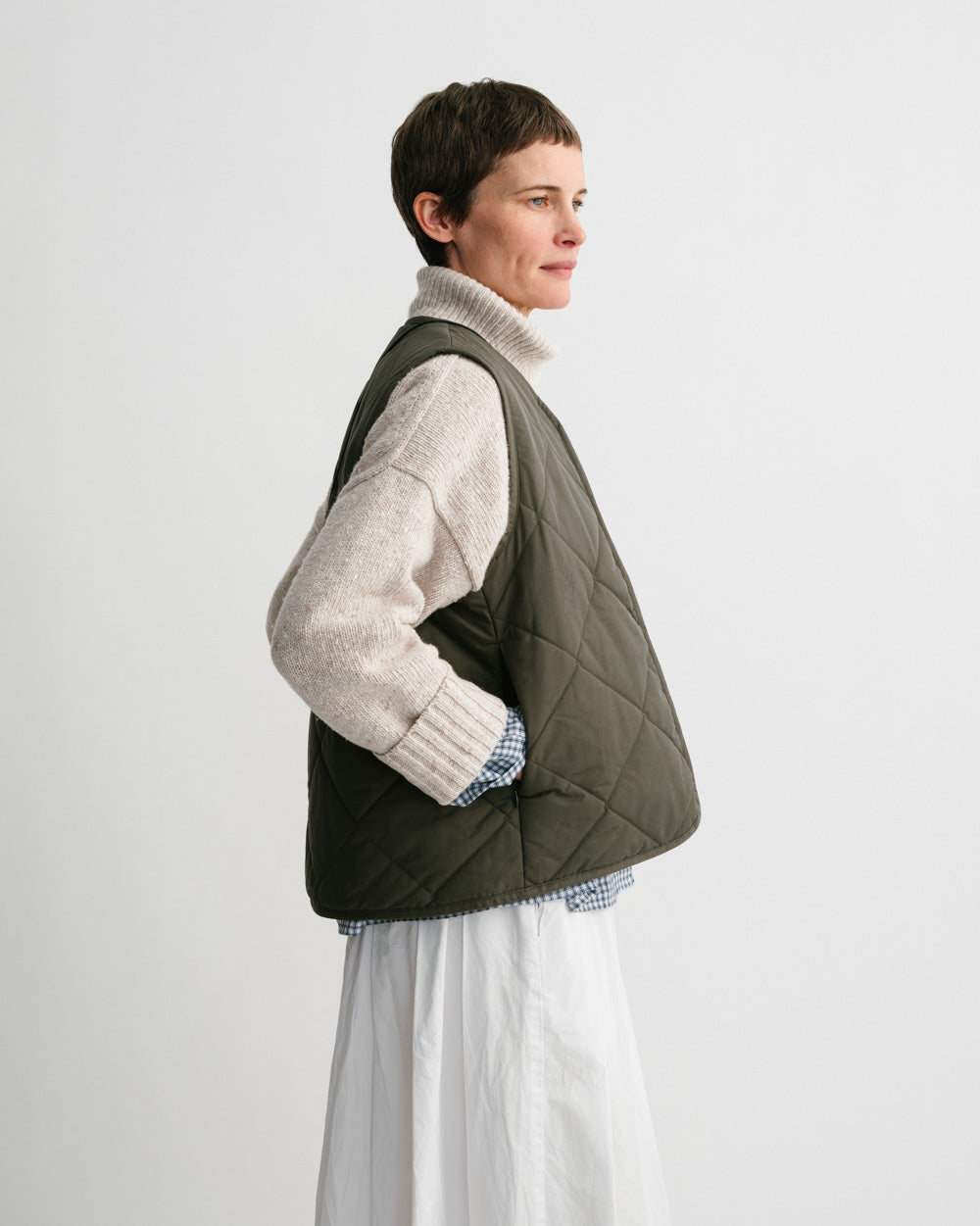 Gallery images of the WOMEN'S SPRUCE GREEN QUILTED VEST