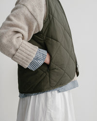 main WOMEN'S SPRUCE GREEN QUILTED VEST